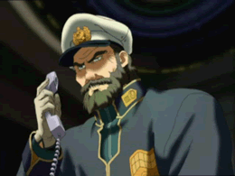 The Captain of the Eldridge holding a phone